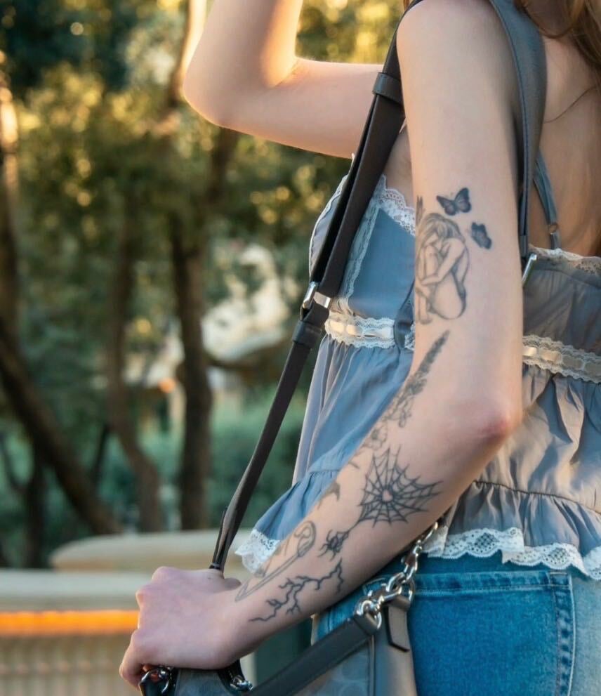 Breezy Bri arm tattoos
